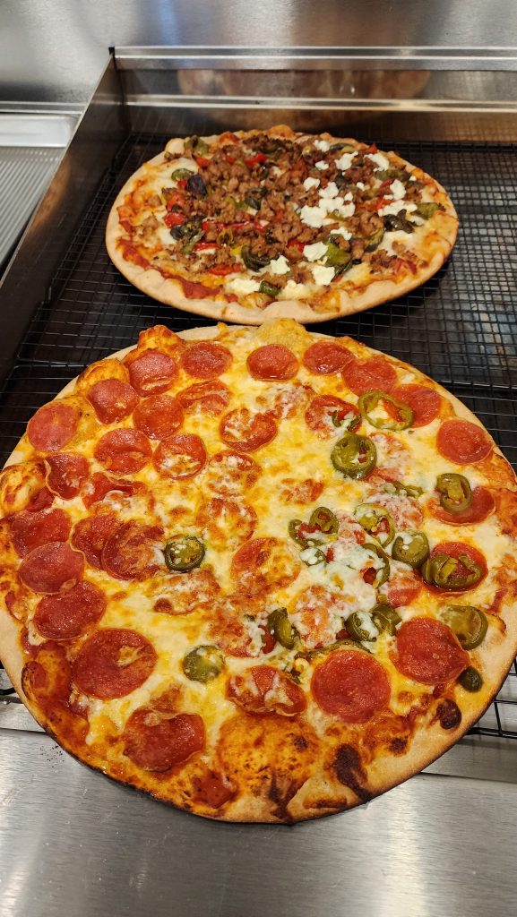 Pizzas on the grill. 